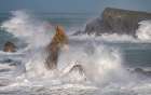 Spain, Liencres. Ocean waves and sea stack formations. Art Print